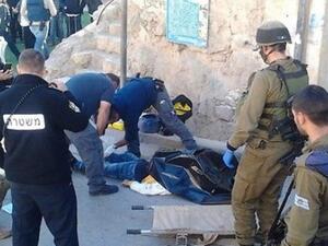 Israeli police are seen at a previous stabbing incident in Hebron. (AFP/File)