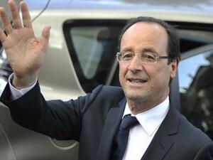 الرئيس الفرنسي يتعهد في العراق بالتصدي للمقاتلين الأجانب وأطفالهم
