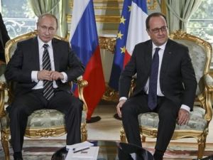 هولاند وبوتين يحاولان التقريب بين مواقفهما حيال سوريا 