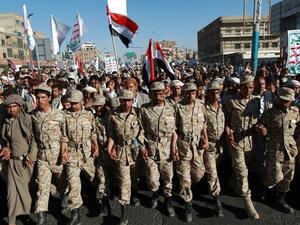 Houthi fighters marched in a demonstration in Sana'a in February. (AFP/File)