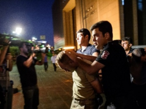 Turkish police arrest soldiers after the failed rebellion July 15. (photo: AFP)