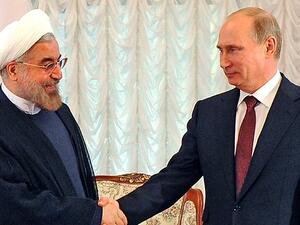 Iranian President Rouhani and Russian President Putin. (AFP/File)