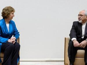 European Union foreign policy chief Catherine Ashton (L) talks to Iranian Foreign Minister Mohammad Javad Zarif before the start of two days of closed-door nuclear talks at the United Nations offices in Geneva. [arneruhnau]