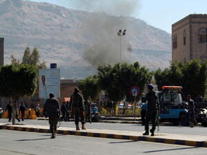 Yemeni soldiers patrol a street after a suicide car bombing at the defence ministry in the Yemeni capital Sanaa on December 5, 2013. [Getty Images]