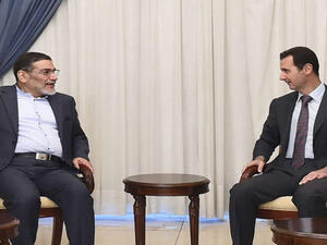 الرئيس السوري بشار الأسد ومستشار الأمن القومي الإيراني علي شمخاني/ أرشيفية
