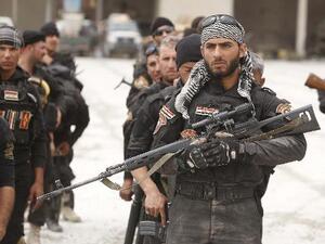 مسلحون من قوات الحشد الشعبي الشيعية 