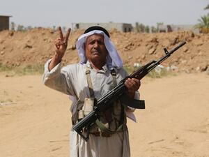 شيخ سني عراقي مقاتل ضد داعش/أ.ف.ب