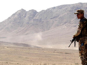  A soldier looks on during the "Eager Lion" military exercise at al-Quwiera near Aqaba city, 290 km (180 miles) south of Amman, on June 19, 2013. Some 8,000 personnel from 19 different nations, including the US, were part of the exercise. (Source: AFP)