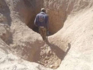 المقبرة الجماعية تضم تضم رفات مدنيين أعدمهم تنظيم "داعش" قرب جبال حمرين