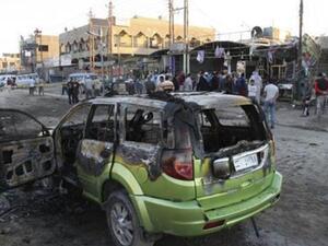 موقع احد التفجيرات في بغداد الثلاثاء