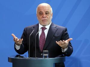 Iraqi Prime Minister Haider al-Abadi speaks at a joint press conference with German Chancellor after their meeting at the Chancellery in Berlin on February 11, 2016. (AFP/Adam Berry)