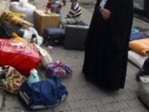 ارشيف: لاجئة عراقية لدى عودتها الى بغداد عام 2008