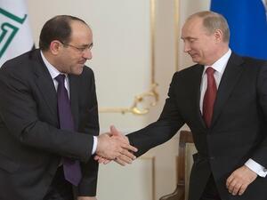 فلاديمير بوتين ونائب الرئيس العراقي نوري المالكي/ ارشيفية