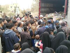 توزيع مساعدات إنسانية على أهالي المناطق التي تم تحريرها في الموصل