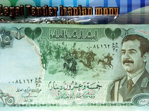 An old Iraqi bank note bearing a picture of Saddam Hussein is displayed in Baghdad. A stash of $27 billion USD at the Moscow airport could have belonged to the ex-dictator. (Image credit: Getty)