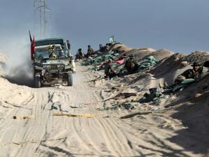 مقاتلون من الحشد الشعبي في بيجي
