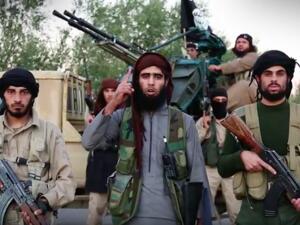 A militant in the video threatened to attack any country participating in airstrikes against the extremist group. (Screenshot)