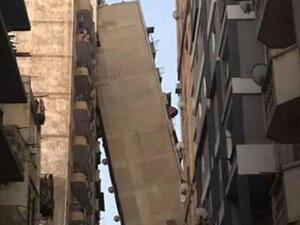 أطلق معلقون تعليقات ساخرة على "تعانق" البنايتين  