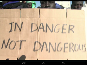 African migrants gather in Jerusalem to protest against Israel's migration policies (Screenshot/Youtube)