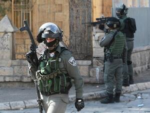 Israeli border guards keep position during clashes with Palestinian youths following a protest over the rights of Palestinian prisoners held in Israeli jails, on February 05, 2016. (AFP/Musa al Shaer)