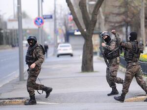Istanbul police walk down a street in full gear. (AFP/File)