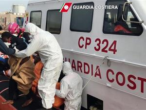 In this handout video capture released by the Italian Coast Guard on April 30, 2016, refugees arrive at Lampedusa harbor after a rescue operation at sea, off the coast of Libya. (AFP/File)