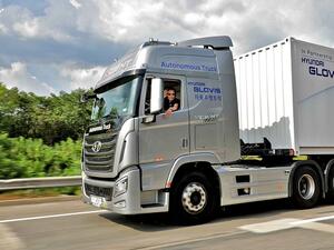 The semi-trailer truck is approximately 3.5 times longer, 1.4 times wider, and 9.2 times heavier than the average compact sedan, when compared with the weight of an empty truck. 
