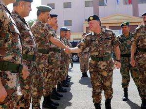 Jordan's King Abdullah II greeting members of the Jordanian Armed Forces in Amman on February 12, 2015. (AFP/File)