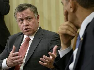 Jordan's King Abdullah II and US President Barack Obama speak during a joint press conference. (AFP/Brendan Smialowski)