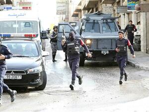 Jordanian forces are seen securing a street in the town of Irbid, 80 kms north of Amman near the border with Syria, on March 2, 2016, following a security operation targeting a group of suspected militants. (AFP/File)