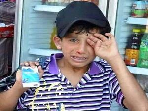 طفل سوري متعرض للضرب والإهانة