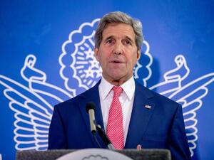 US Secretary of State John Kerry gives a statement after meeting with Somalian President at the airport in Mogadishu on May 5, 2015. (AFP/Andrew Harnik)