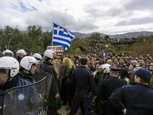 People protest against the so-called "hotspot" being built for refugees and migrants on the Aegean island of Kos, on February 14, 2015. (AFP/Stringer)