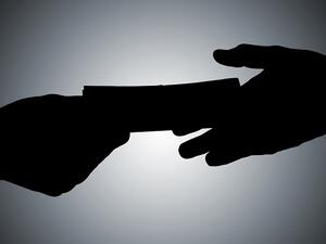The cost of bribery in Kuwait is $2 billion a year, or two percent of the country's total GDP. (File photo)