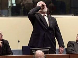 He appeared to drink from a small bottle seconds after losing his appeal (AFP/File)

