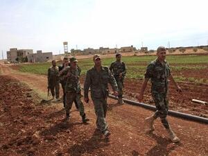 قوات موالية للحكومة السورية تسيطر على بلدة في اللاذقية
