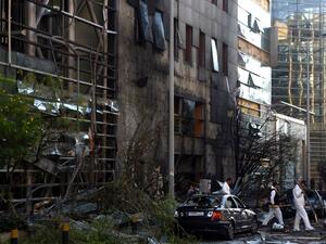 Investigators at the scene of the BLOM bank bombing in Beirut on June 13, 2016. (AFP/Patrick Baz)