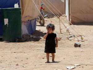 طفلة سورية في مخيم للاجيئن في بلدة عرسال اللبنانية/أ.ف.ب