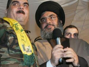 سمير القنطار مع الامين العام لحزب الله/ارشيفية