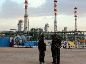 The four men were taken west of Tripoli, the foreign ministry said Monday. (AFP/Mahmud Turkia)