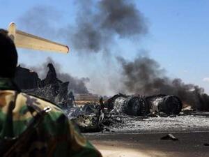 The remains of a burnt airplane seen at the Tripoli International Airport in Libya on July 16, 2014. (AFP/Mahmud Turkia)
