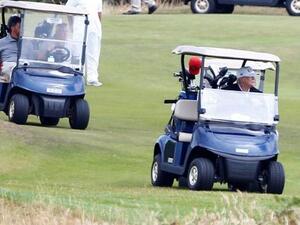 Trump plays golf in Scotland (Twitter)