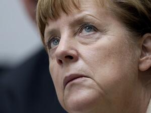 Chancellor Angela Merkel was criticized Thursday for appearing indifferent to the Palestinian girl's story and trying to stroke her hair. (AFP/File)