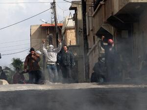 Anti-government protestors gesture on the streets of Dera'a, 100kms south of the capital Damascus. (AFP PHOTO/ANWAR AMRO) Anti-government protestors gesture on the streets of Dera'a, 100kms south of the capital Damascus. (AFP PHOTO/ANWAR AMRO)