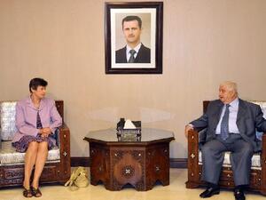 Syrian Deputy Prime Minister, Foreign and Expatriates Minister Walid al-Moallem (R) meets with a Angela Kane (L), the UN high representative for disarmament, in Damascus on August 25, 2013. (AFP)