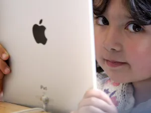 'These children lead sedentary lives with their gadgets' in UAE, says a doctor while texting on her phone. 