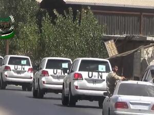 An image grab taken from a video uploaded on YouTube by the Eastern Ghouta Media Centre on August 28, 2013 allegedly shows United Nations (UN) vehicles travelling to the site where rockets had fallen in Damascus' eastern Ghouta suburb during an investigation into a suspected chemical weapons strike near the capital. (AFP/YouTube)
