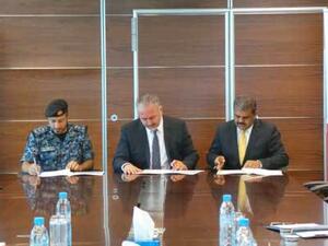 Colonel Sameer Jassim Showaiter, Mr. Mohamed Ahmed Mohamed Yateem and Mr. Silvan Varghese during the signing. Colonel Sameer Jassim Showaiter, Mr. Mohamed Ahmed Mohamed Yateem and Mr. Silvan Varghese during the signing.