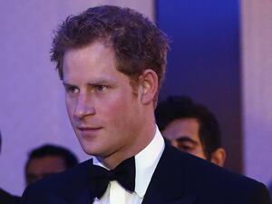 Peace be upon you, good evening, hello! Prince Harry stumbled over his Arabic during a dinner in Dubai. (AFP)
