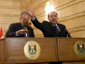 المالكي يصد الحذاء عن بوش